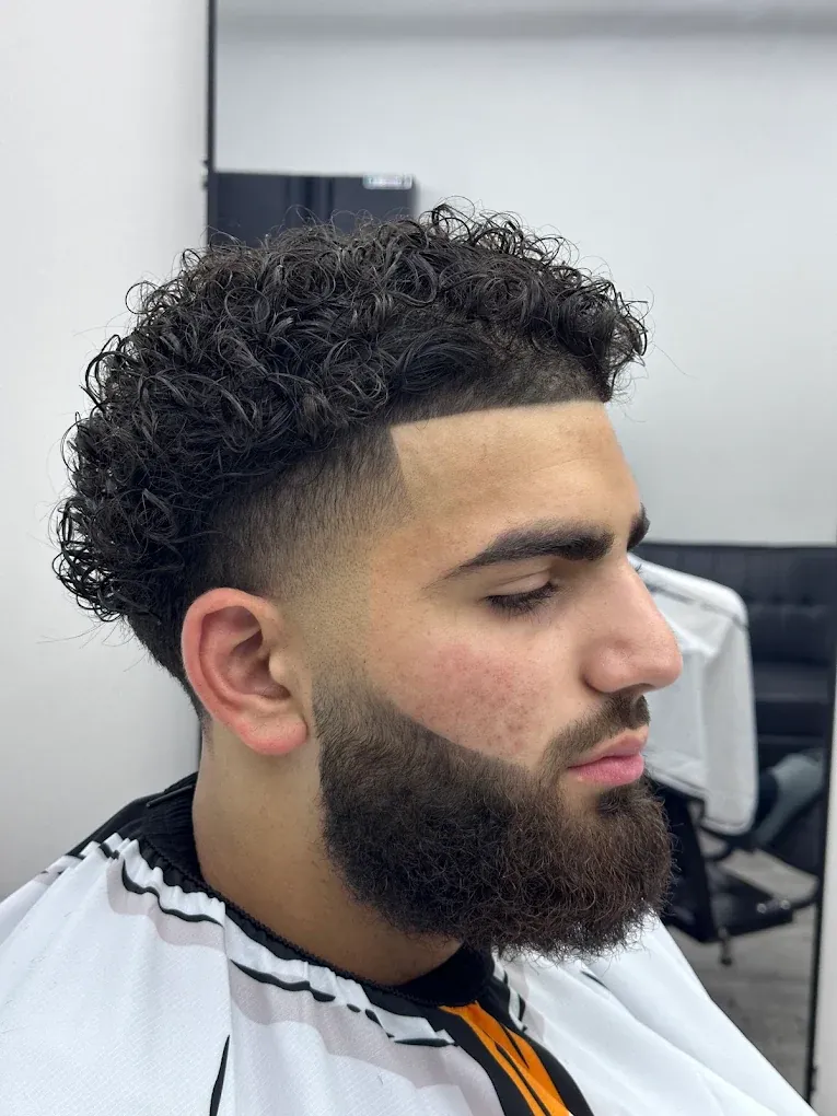 Precision fade and lineup work by the barbers at Blends Barbershop in Denham Springs